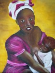 Une jeune femme africaine allaitant son bébé.